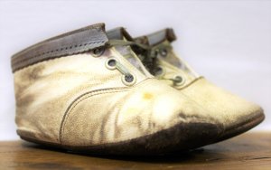 A pair of old white shoes